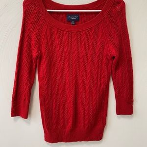red knit sweater
